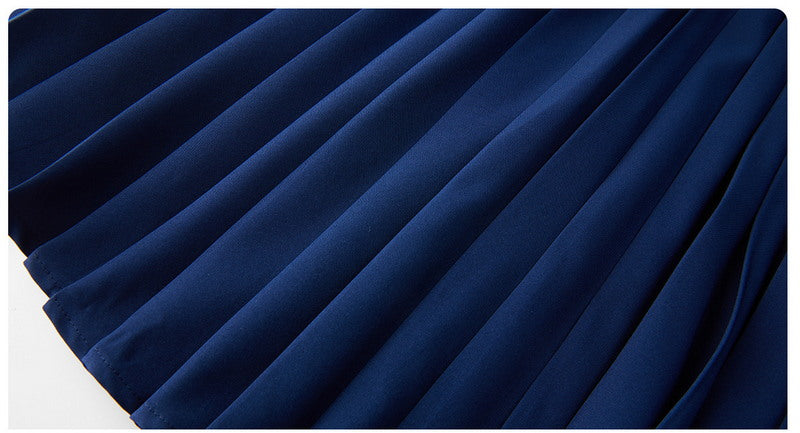 BackSwing Pleated Dress