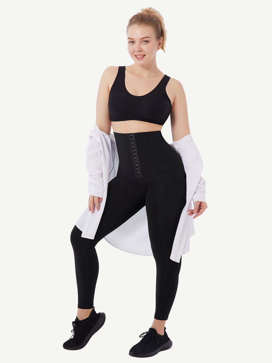 a woman in a black sports bra top and leggings