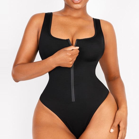 a woman in a black bodysuit