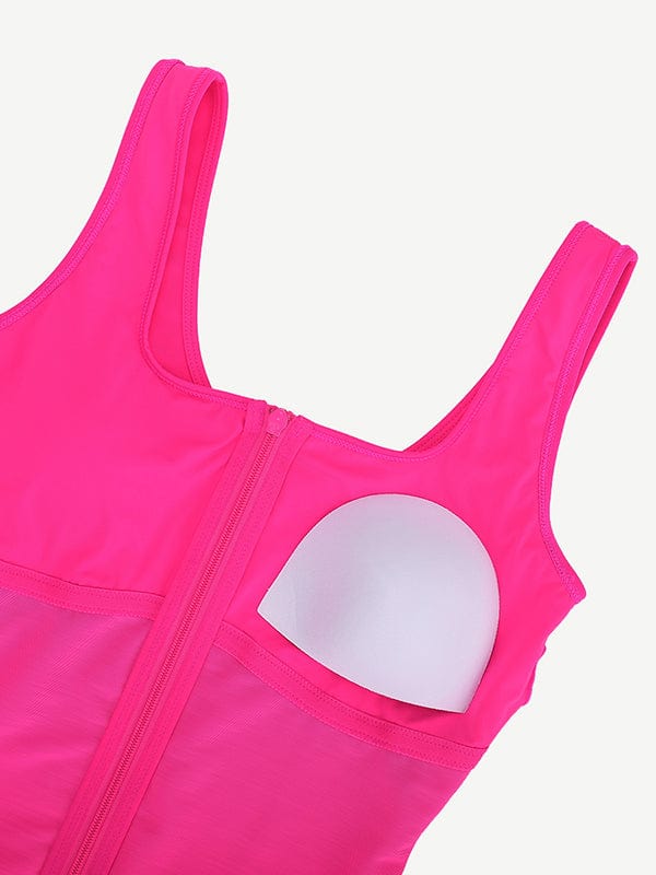 a woman's pink sports bra with a zipper