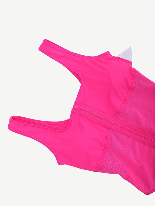 a woman's pink sports bra with zippers