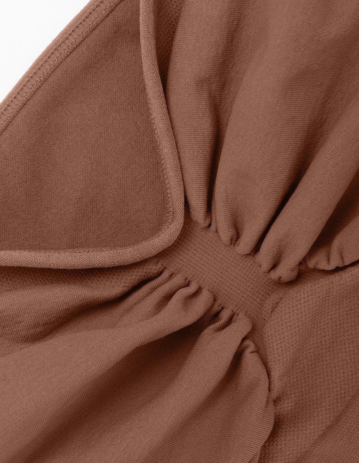 a close up of the back of a brown shirt