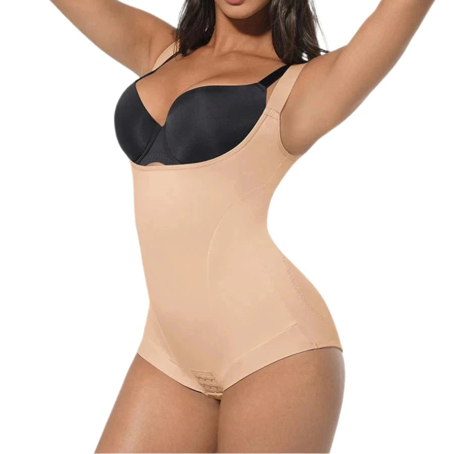 Beige bodysuit with black bra on a white background
